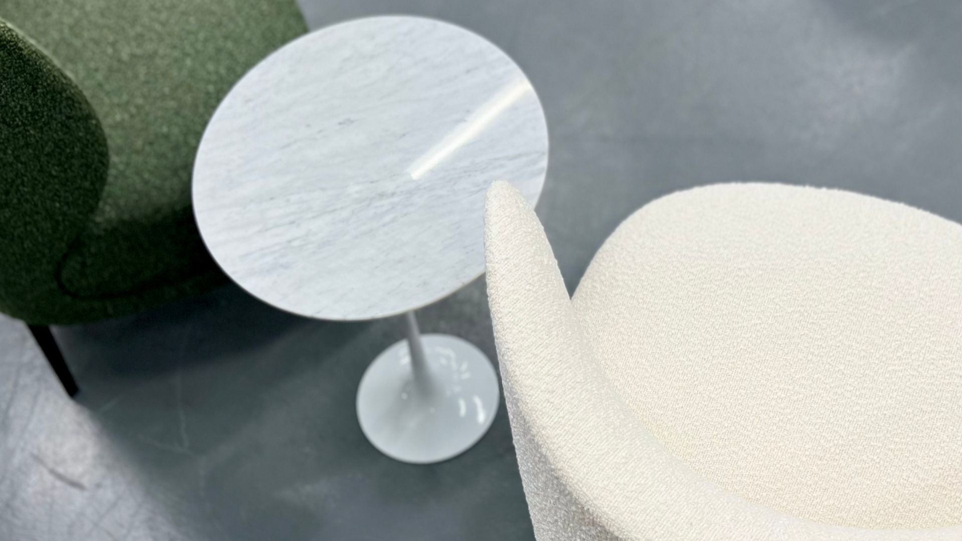 Close up of a green and cream accent chair