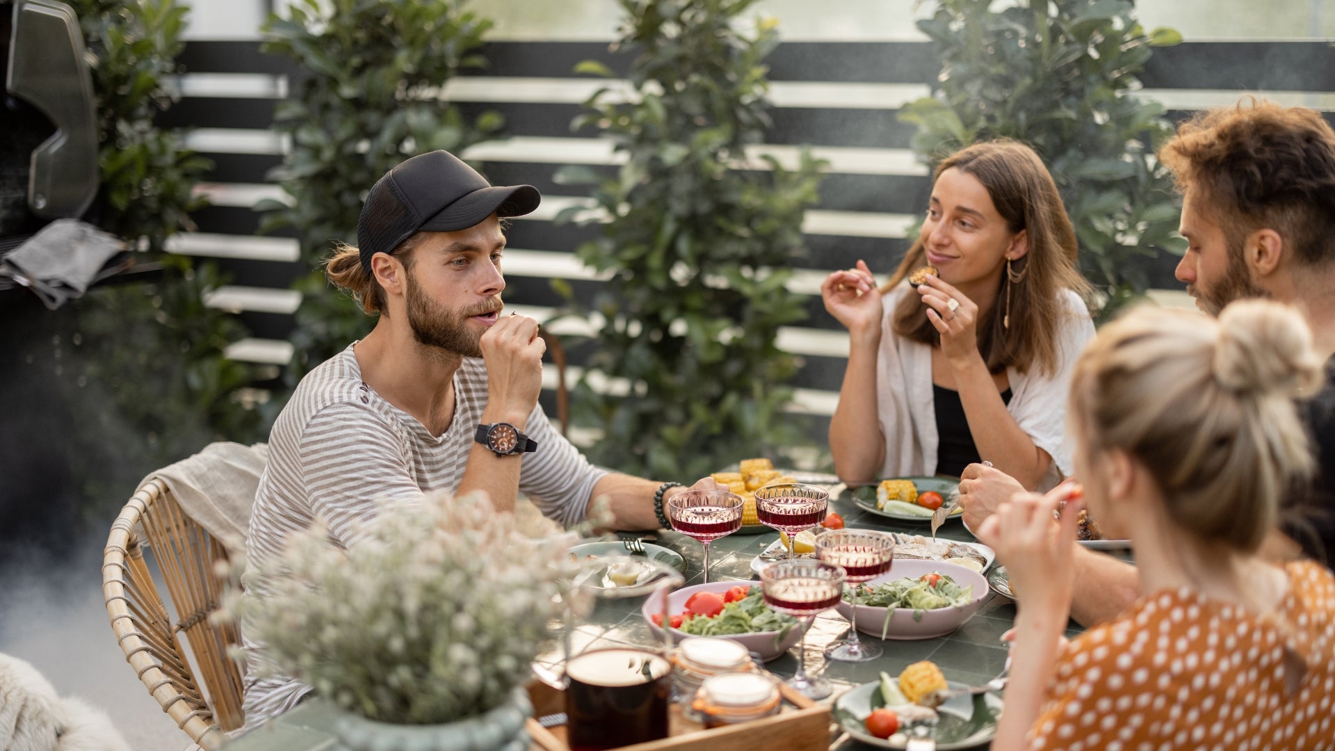 People dining in the backyard in summer